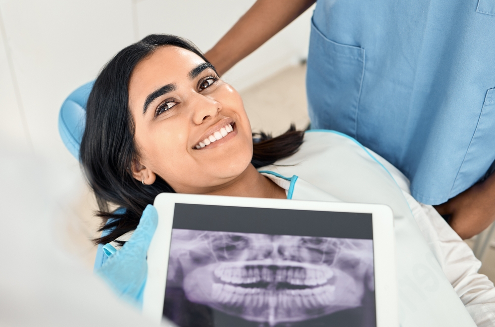Woman,,Dentist,And,Smile,With,Dental,Xray,Or,Results,In