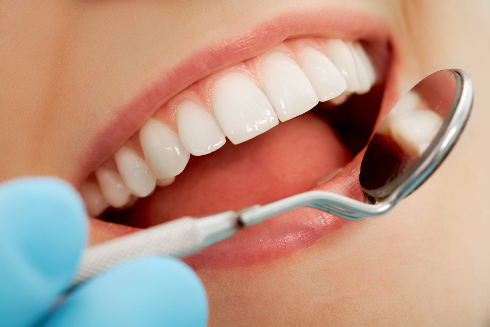 smiling during dental checkup